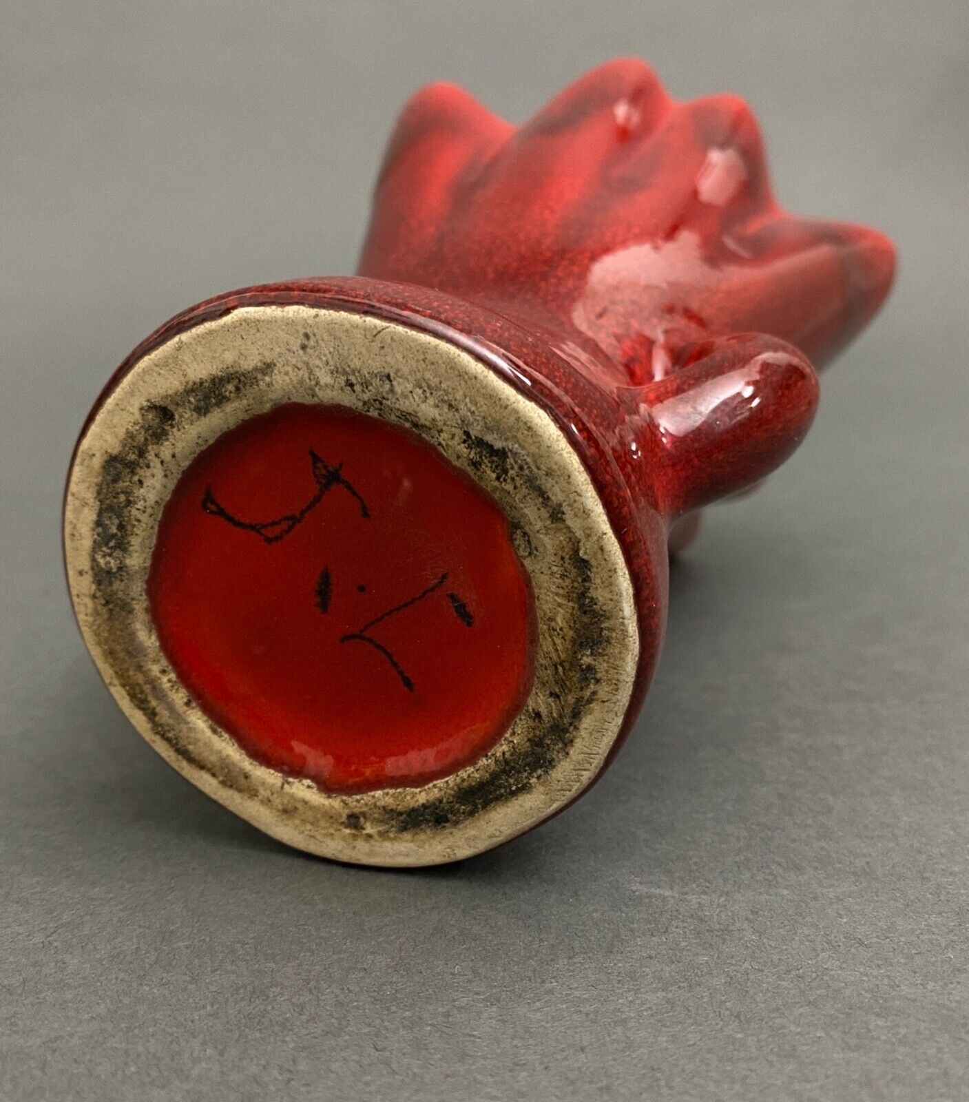 Free form red ceramic vase 1960 by J.L. or J.C.