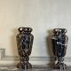 Paire de vases en marbre Portor, vers 1920