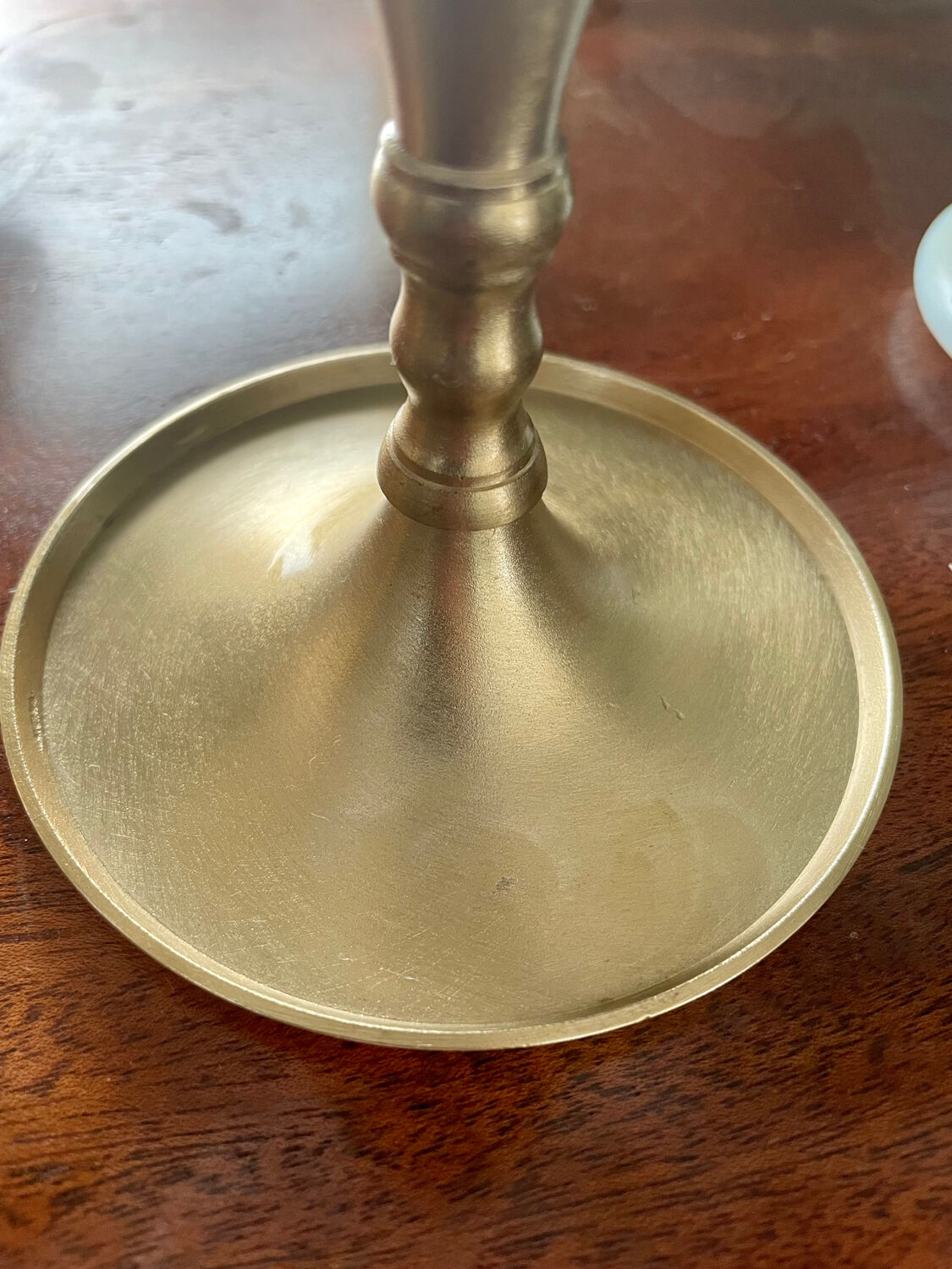 Pair of brushed brass candle holders