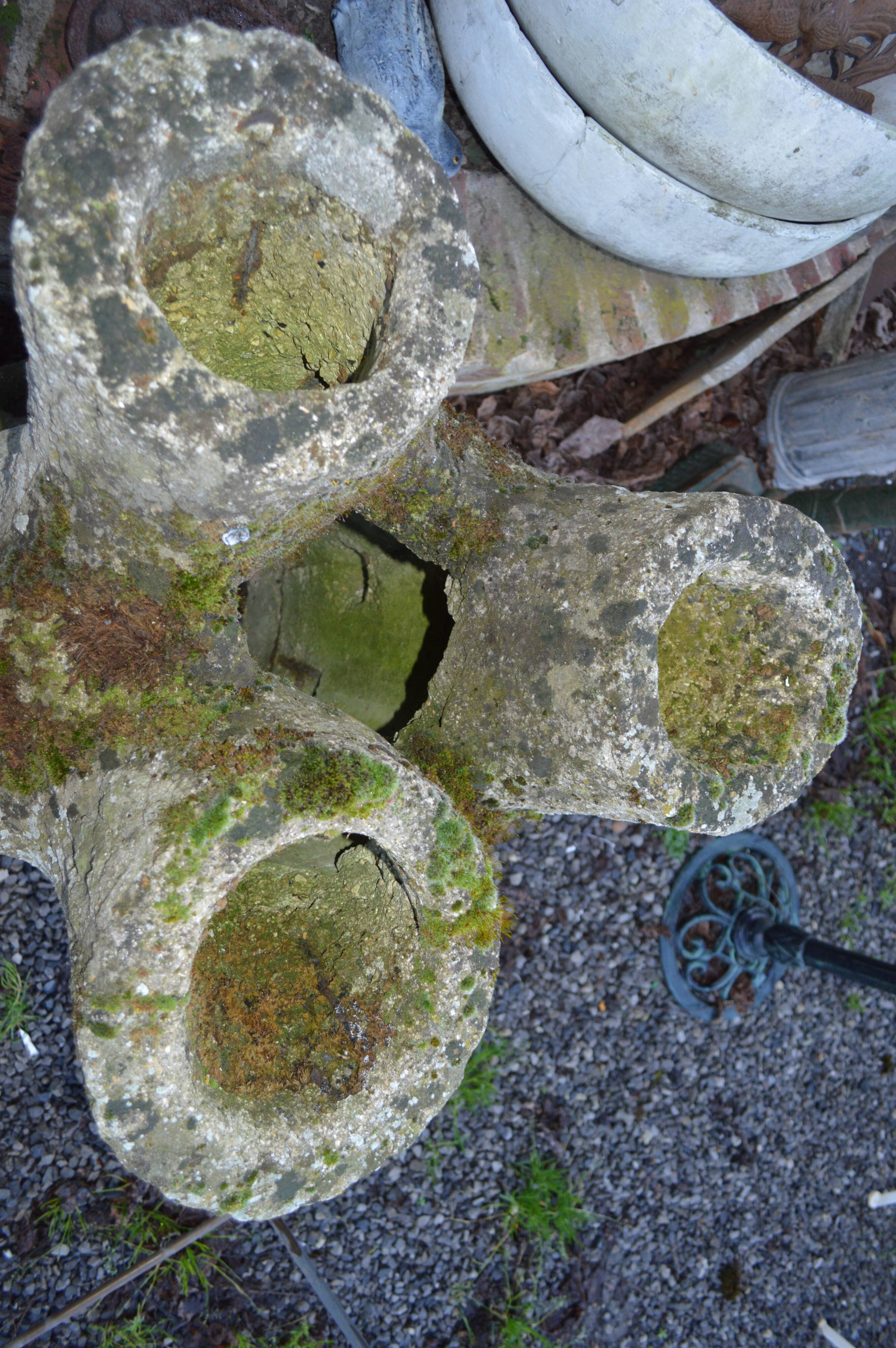 Concrete tree trunk planter