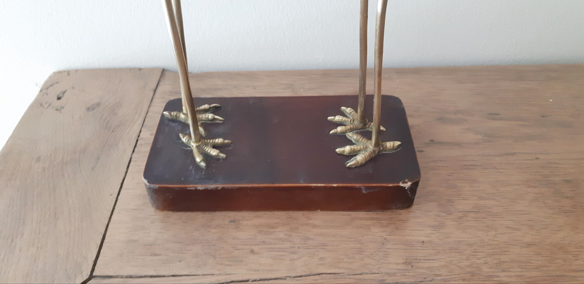 Couple of wading birds in brass on wooden base