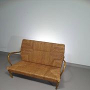 Vintage French papercord sofa with a metal frame base