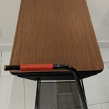 Red scoubidou handles wheeled serving table