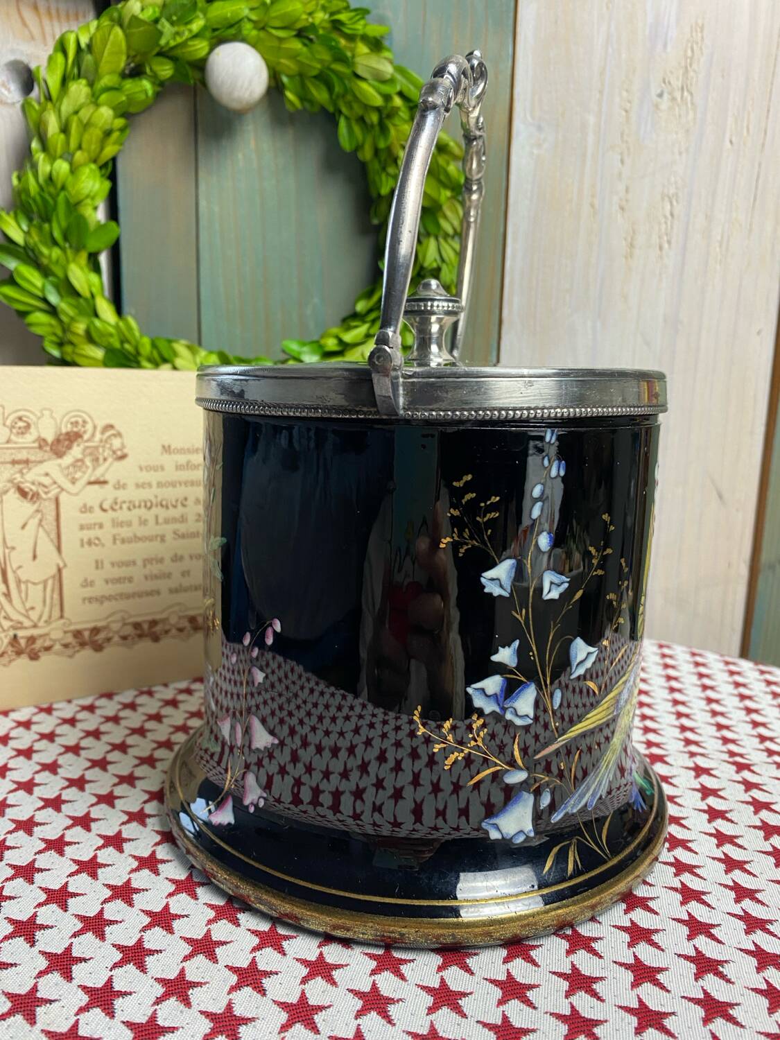 English porcelain and silver-plated metal cake tin