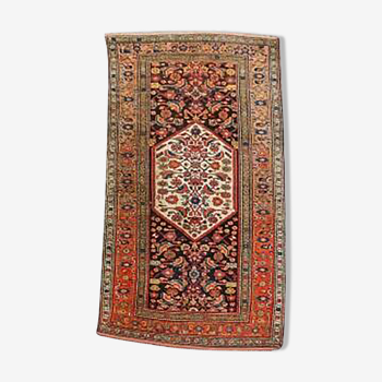 Colorful handmade rug with oriental patterns 225 x 115 cm