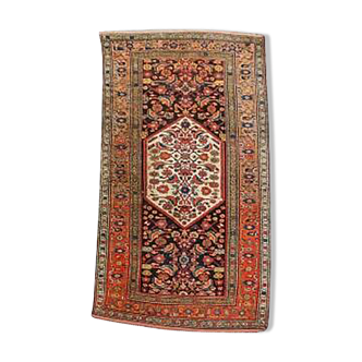 Colorful handmade rug with oriental patterns 225 x 115 cm