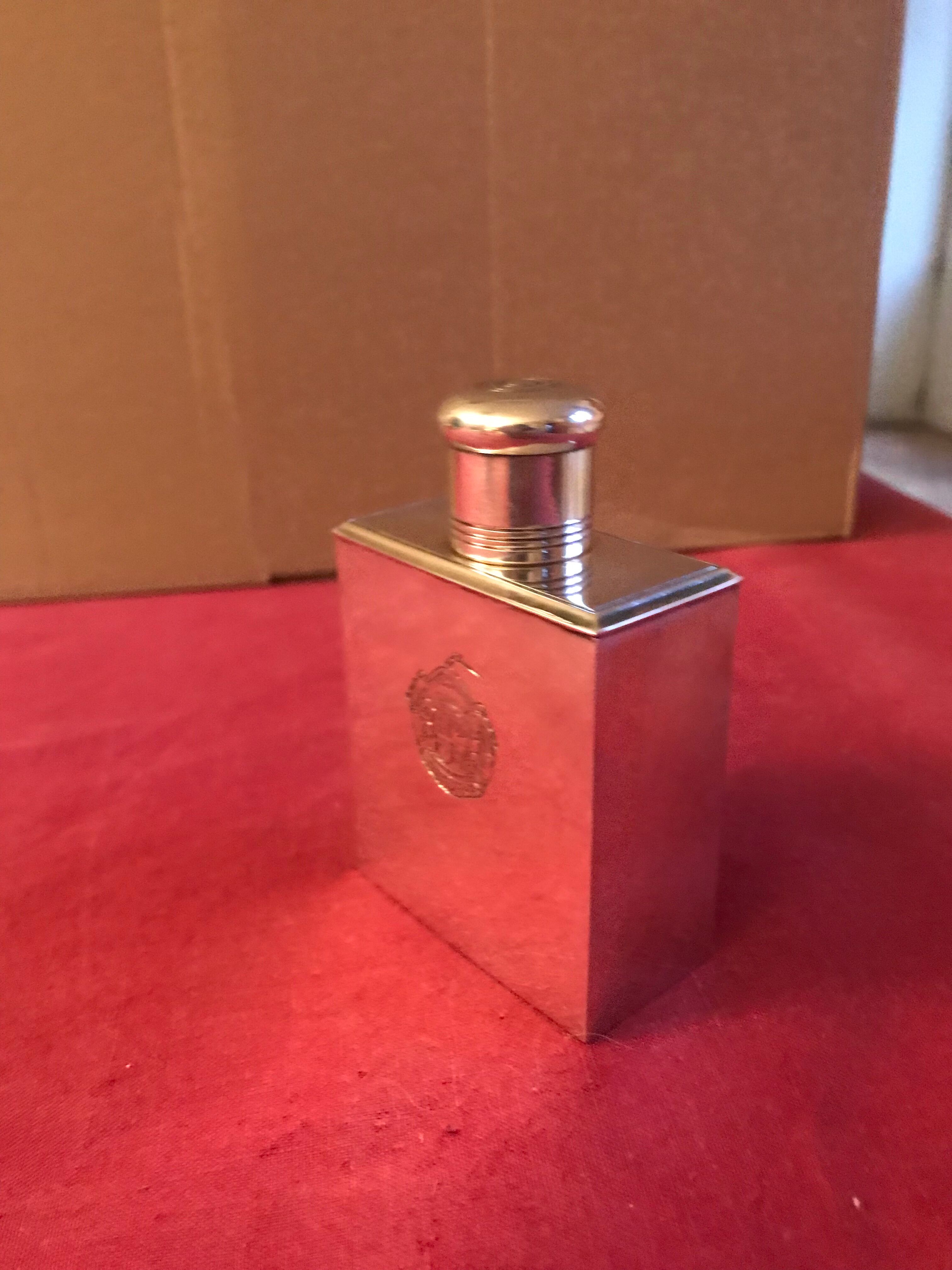 Silver metal perfume bottle