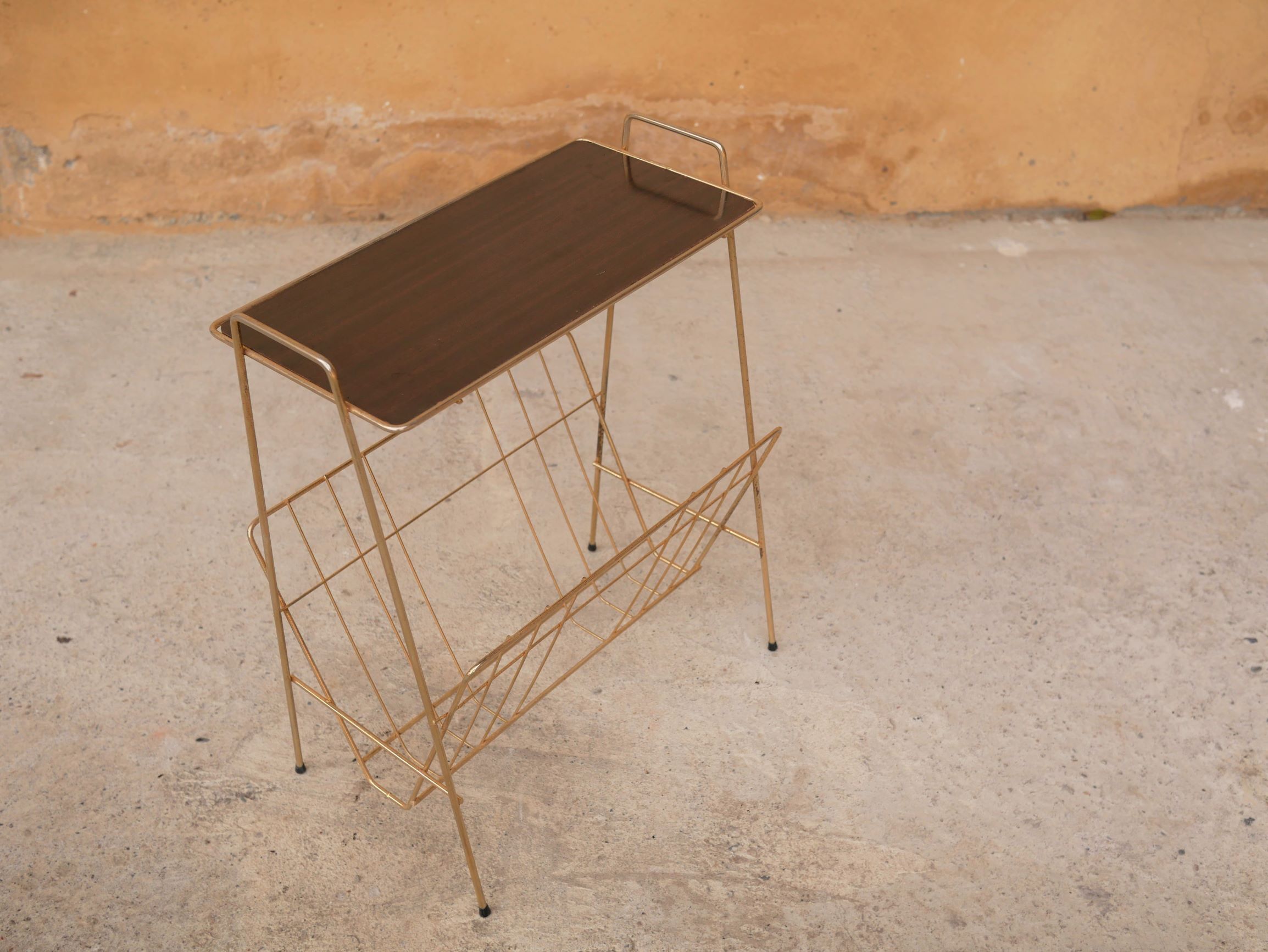 Vintage gold metal magazine rack