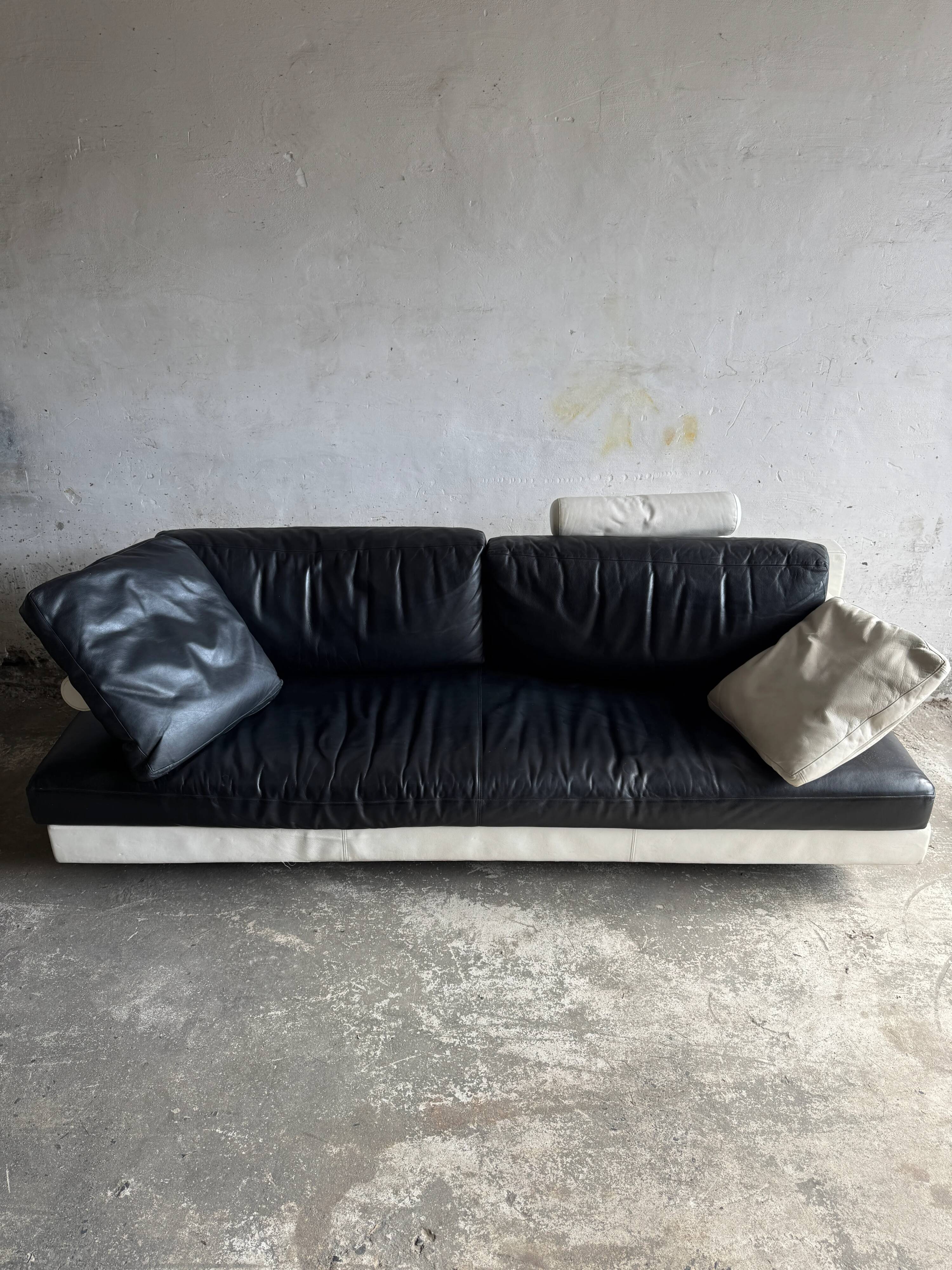 BnB Italia Sity 2-seater leather sofa — black seat with white leather base