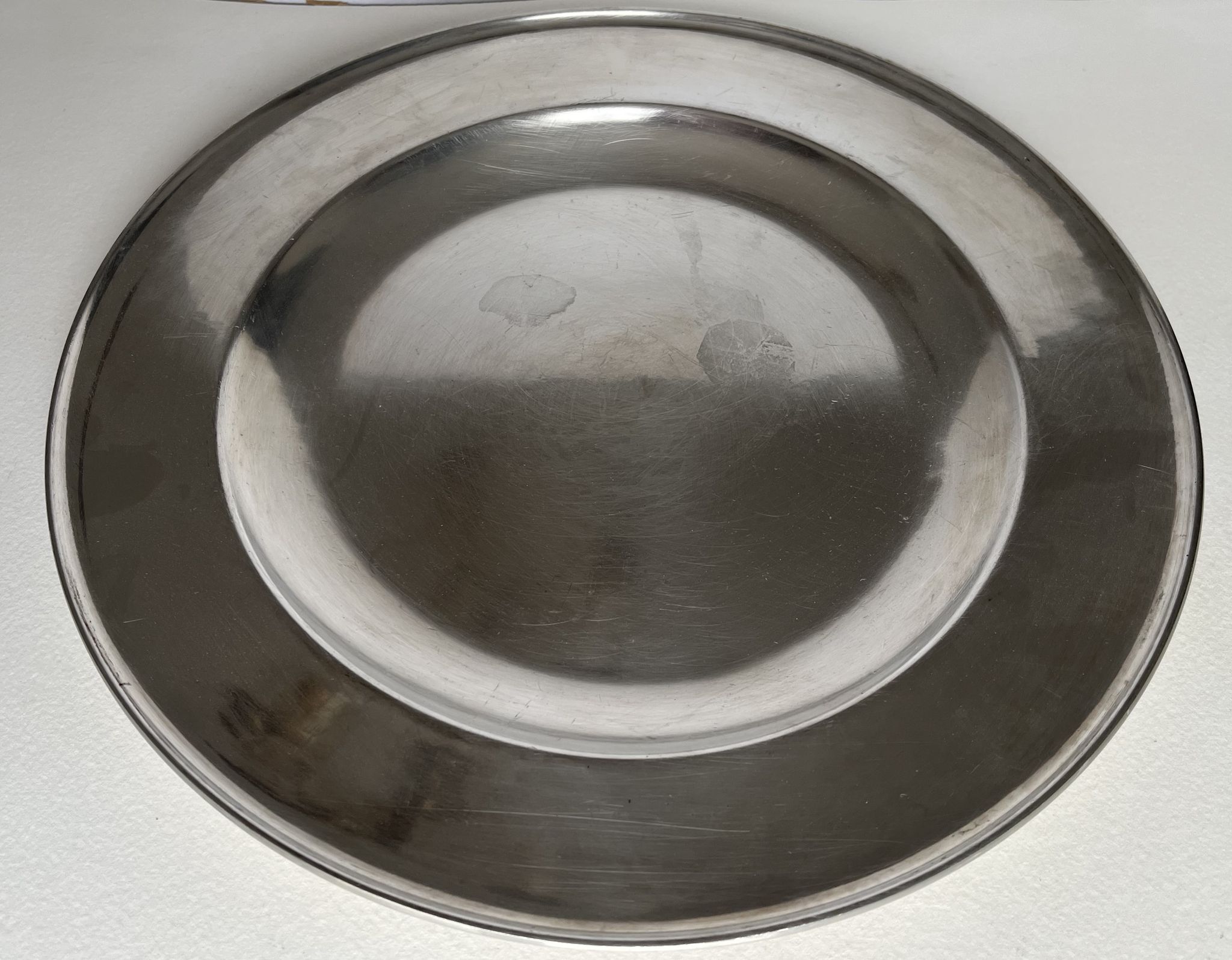 Circular pewter dish
