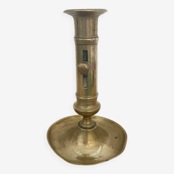 Brass candle holder with push button