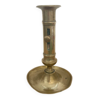 Brass candle holder with push button