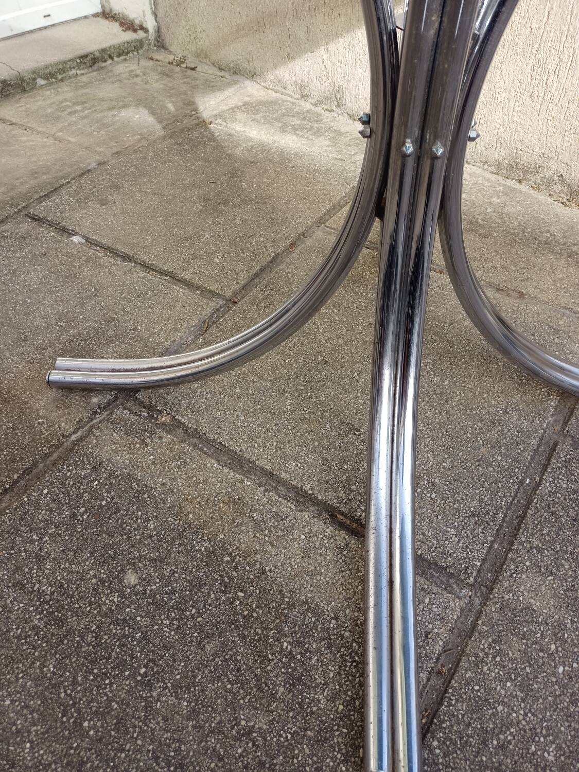 Chromed metal and smoked glass table