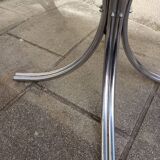 Chromed metal and smoked glass table