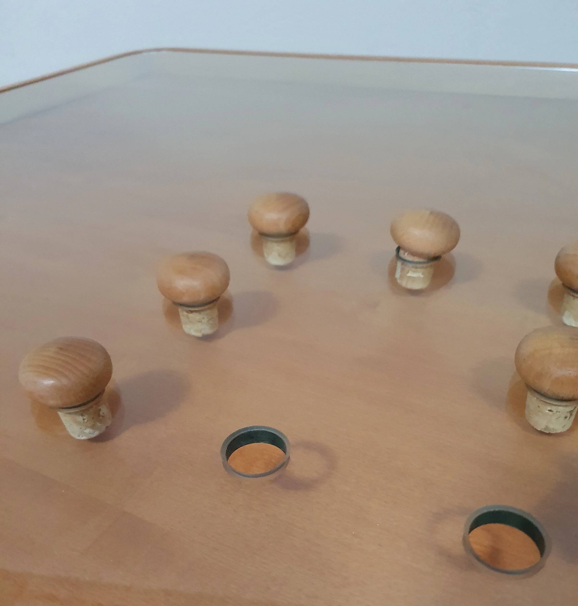 Rare coffee table 110 x 110 x height 35 cm with 8 flange wooden / cork caps in the glass top.