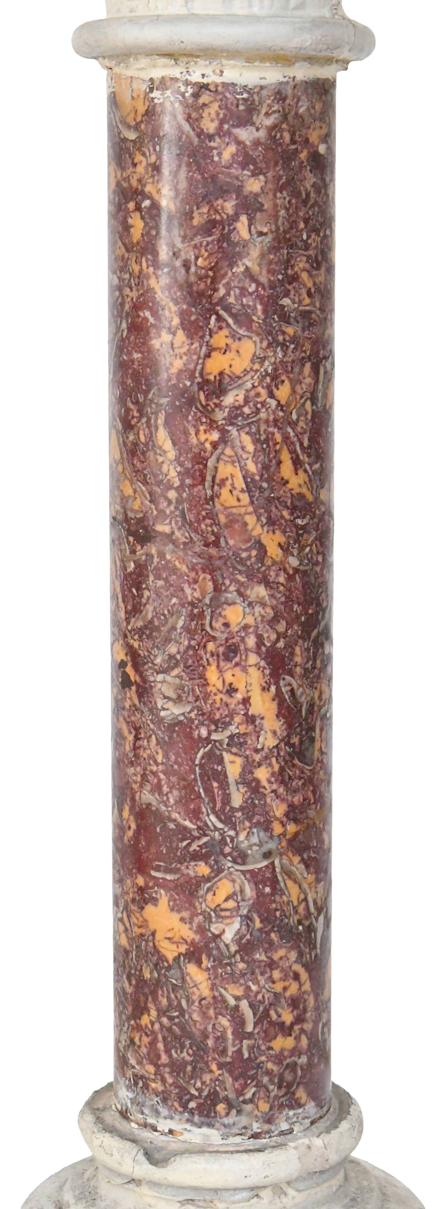 Pair of Brocatelle marble columns and stone with Corinthian capitals.