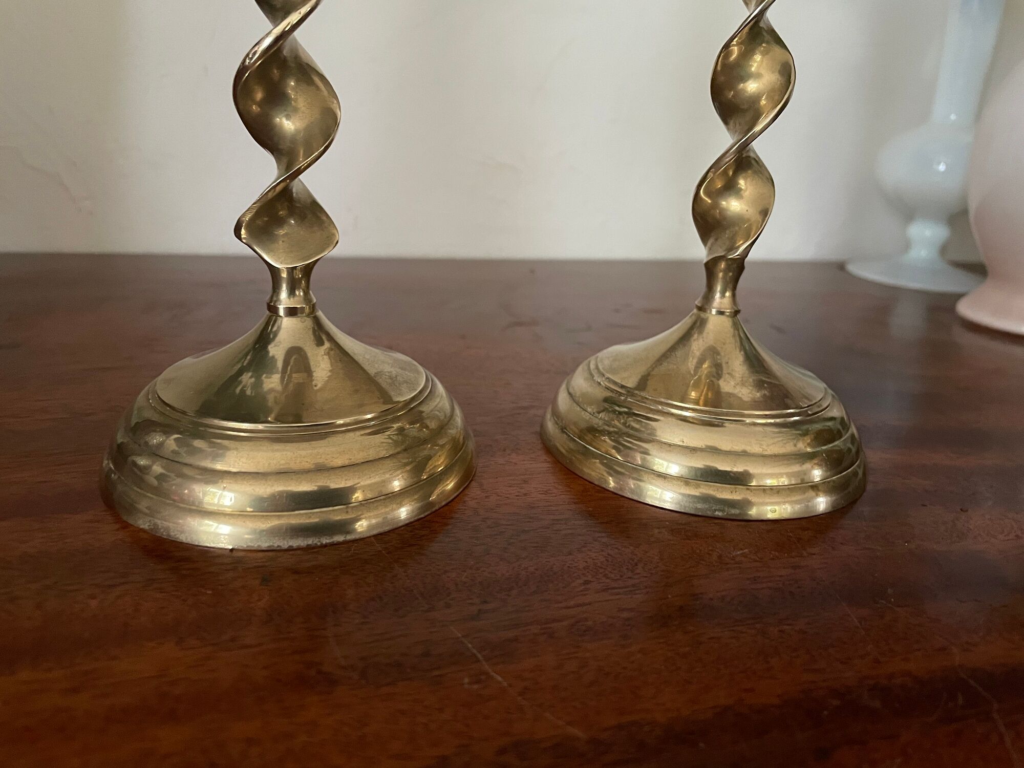 Pair of twisted brass candle holders