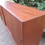 Low sideboard with 3 sliding doors in teak. Denmark 1960