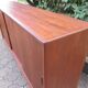 Low sideboard with 3 sliding doors in teak. Denmark 1960