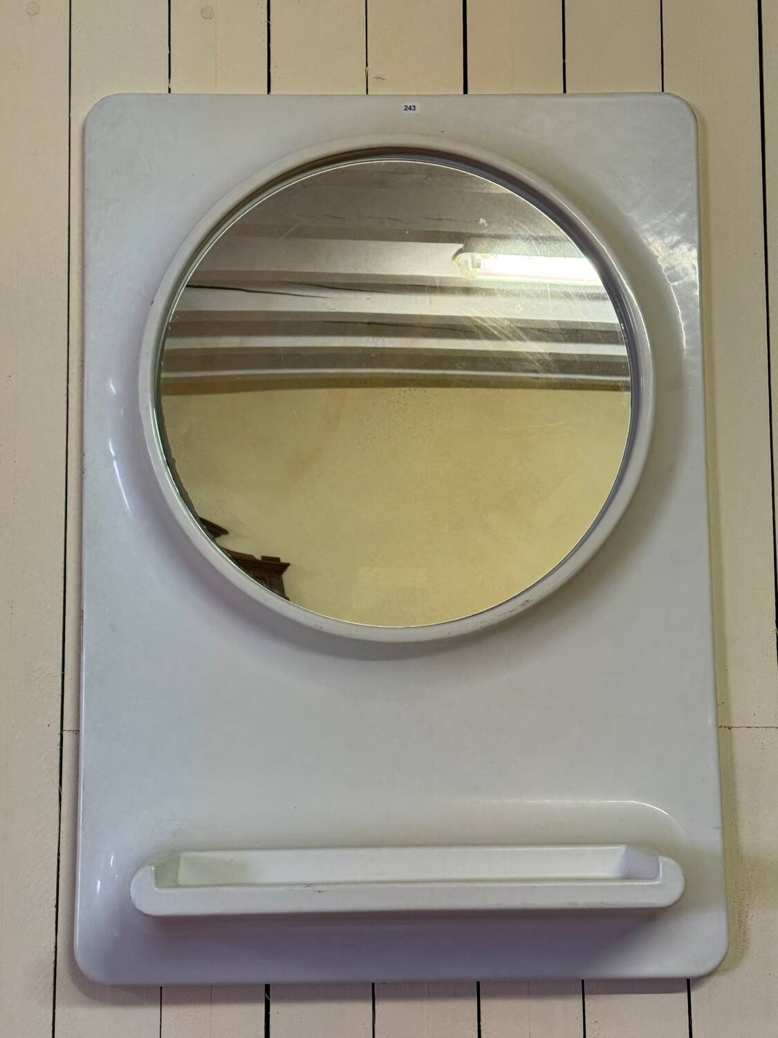 Mirror, wall-mounted with shelf