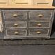 Antique piece of furniture with 6 drawers