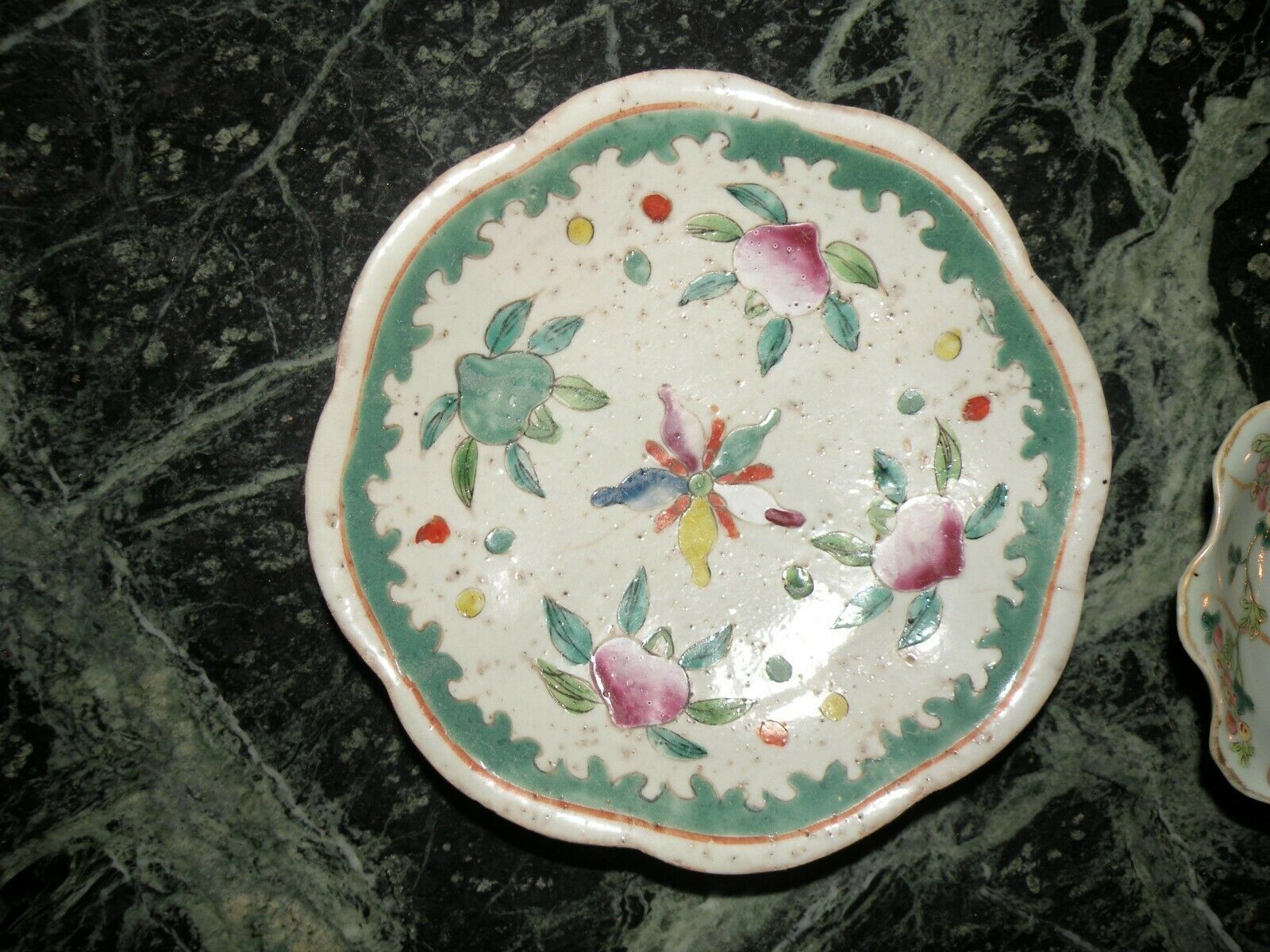 Plate China period nineteenth decorated enamelled stylized with fruit