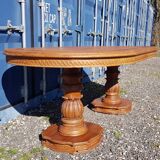 Oval dining table in solid teak