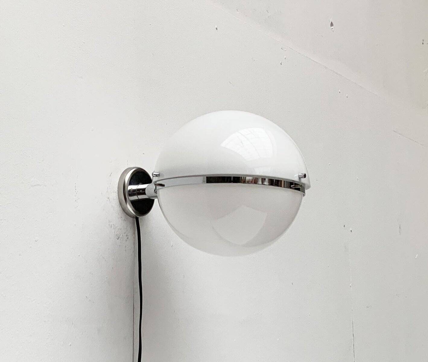 Mid-century Italian space age spherical wall light by Guzzini.