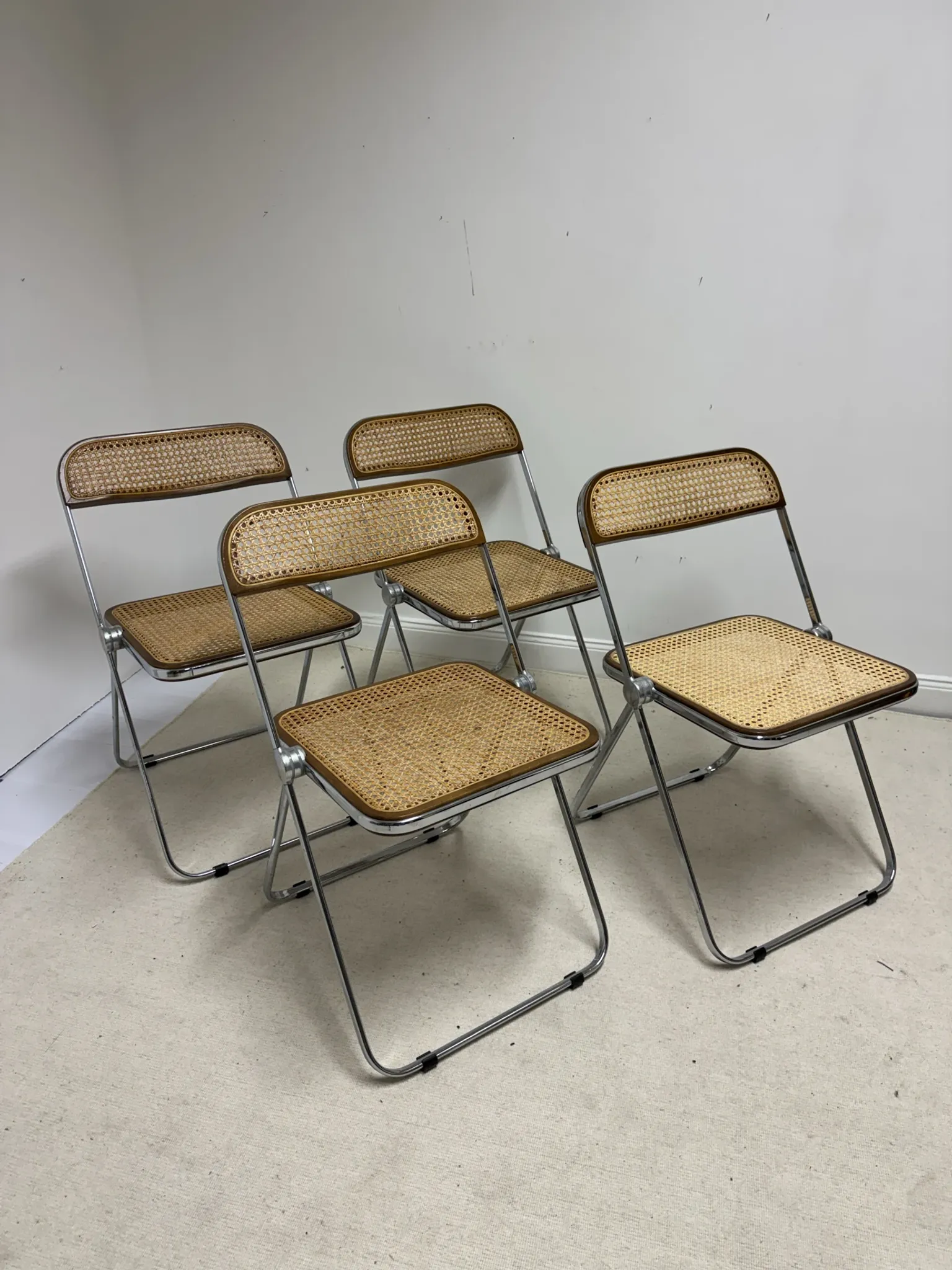 4 chaises Plia par Giancarlo Piretti