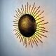 French gilt metal sunburst light fixture, Gilbert Poillerat, 1930s France