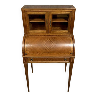 Cylinder desk topped with a Louis XVI style marquetry display case