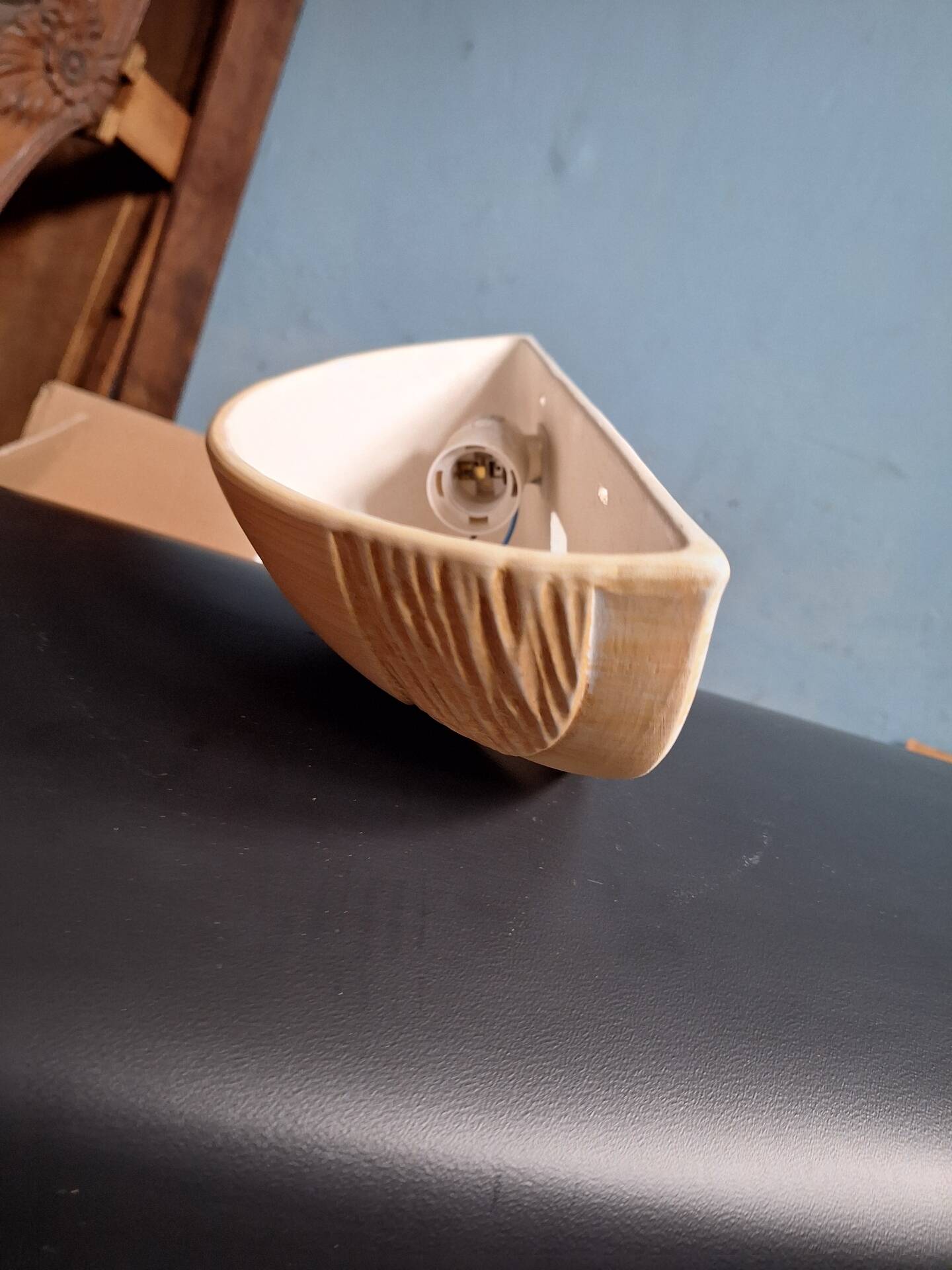 Yellow stoneware half-moon wall light