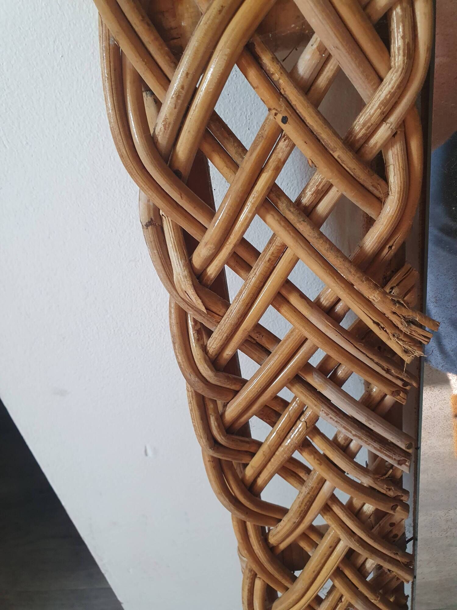 large vintage mirror in woven rattan 66 86 cm with some defects
