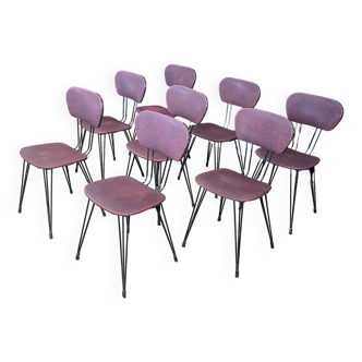 Set of 8 retro burgundy leatherette chairs with black metal Eiffel legs from the 1950s