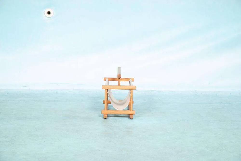 Bohemian magazine rack in vintage 70s pine style.