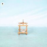 Bohemian magazine rack in vintage 70s pine style.