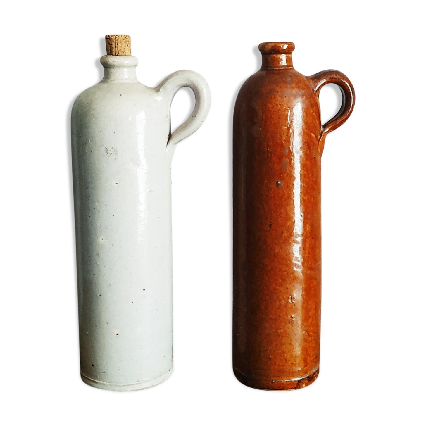 Pairs of sandstone jugs