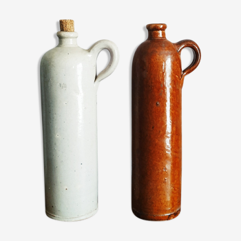 Pairs of sandstone jugs