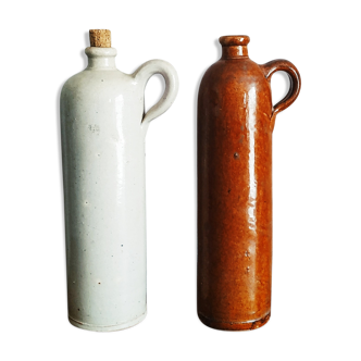 Pairs of sandstone jugs