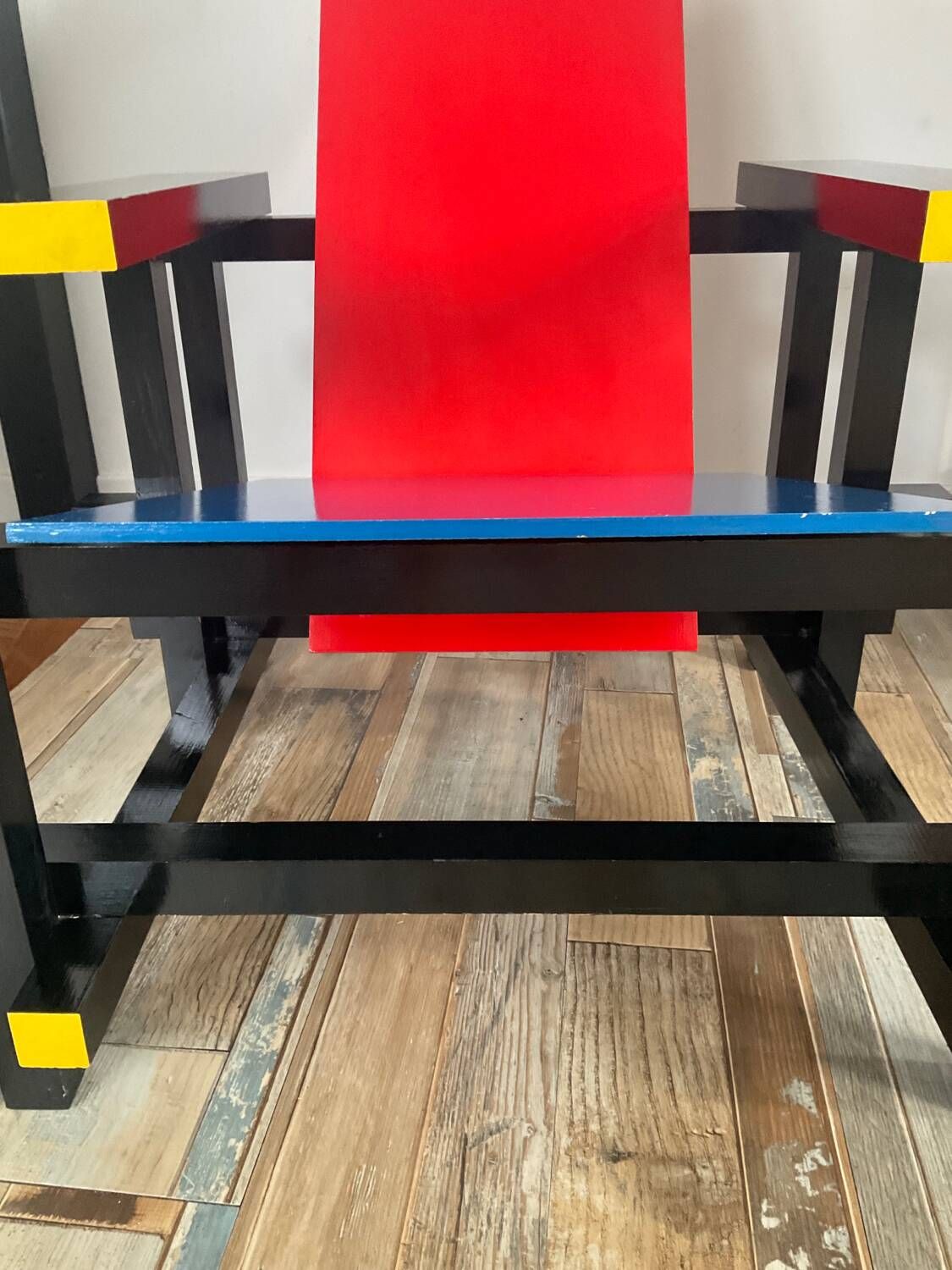 “Red and blue” lounge chair in the style of Gerrit Rietveld