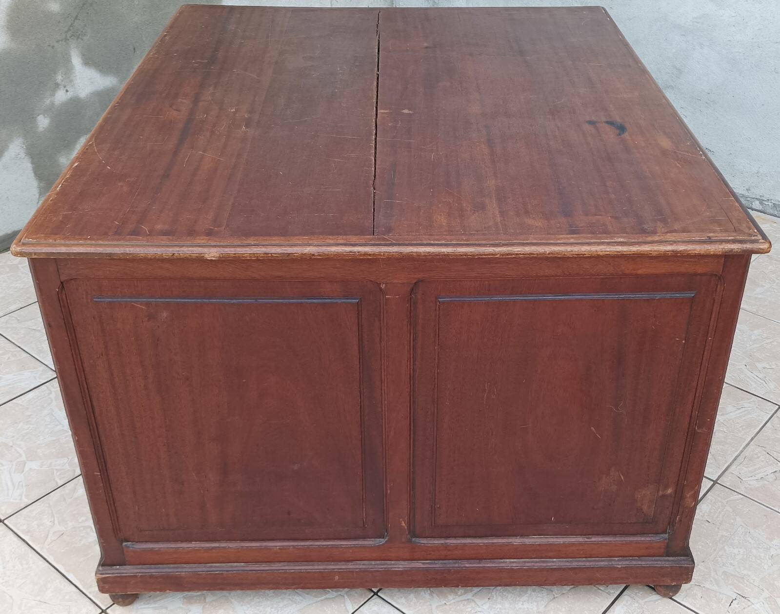 Vintage double-sided mahogany desk with 18 drawers.