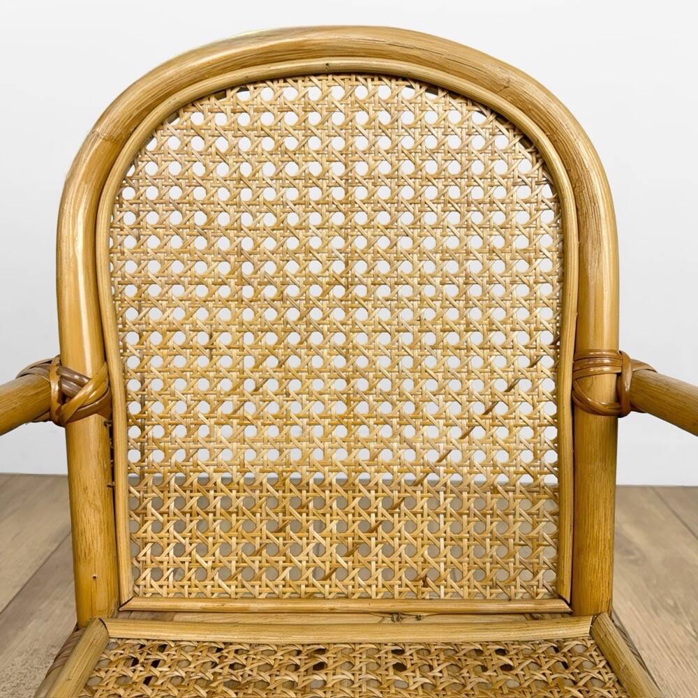 Child's armchair in rattan and caning from the 1960s.