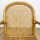Child's armchair in rattan and caning from the 1960s.