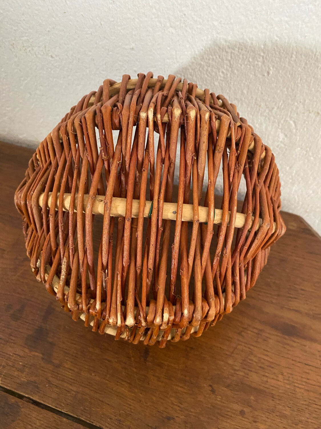 Small handmade basket made of hazel wood.