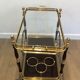 Rolling table in brass and mahogany with removable trays