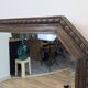 Antique beveled octagonal vanity mirror in carved wood