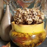 Old provencal pot cover in glazed terracotta