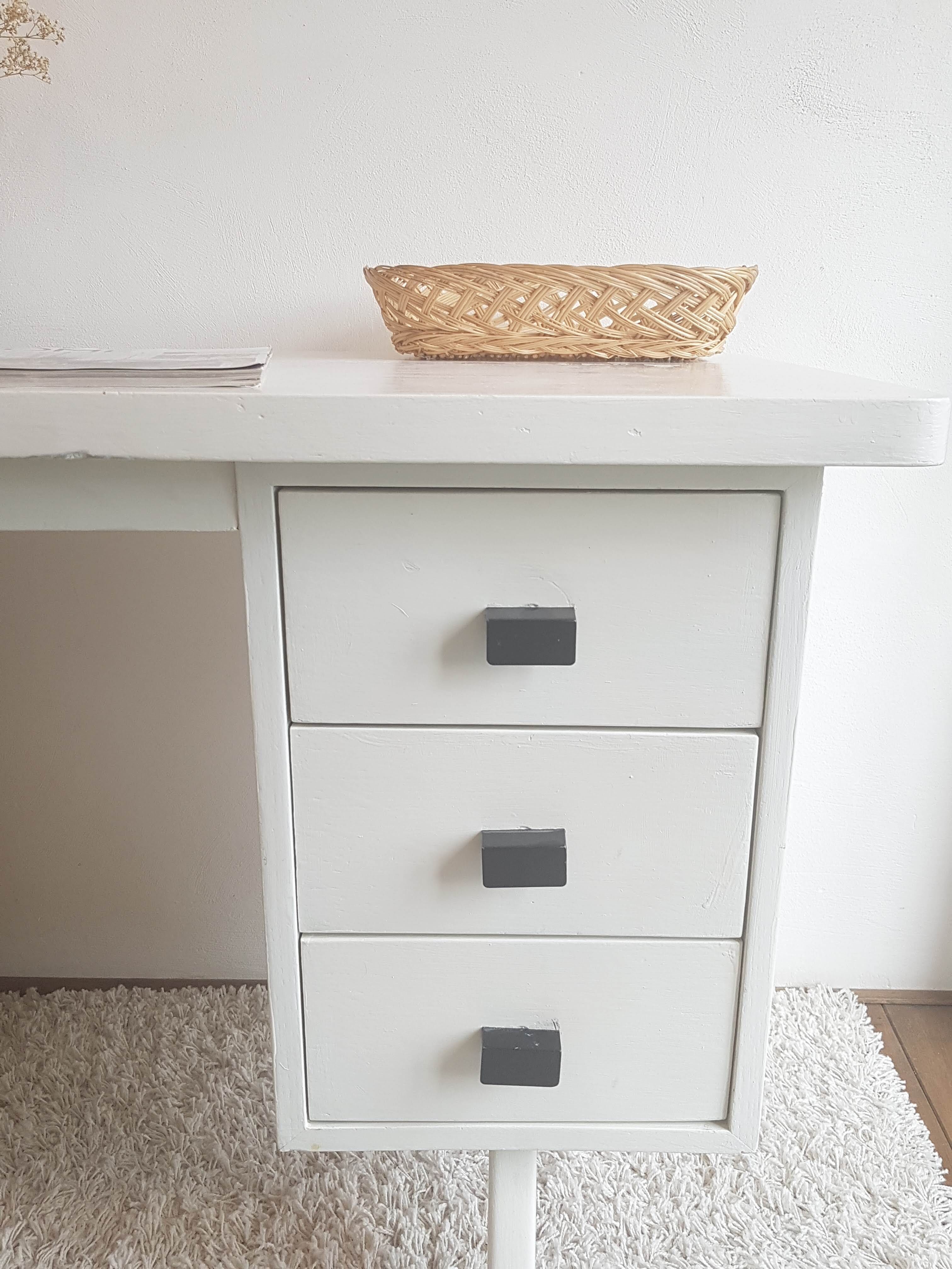 White desk with compass feet circa 1960
