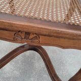 Louis XV Regency cane armchair leather armrests decorated with shell