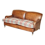 George Smith Signature Scroll leather canapé with tartan Scottish wool cushions.